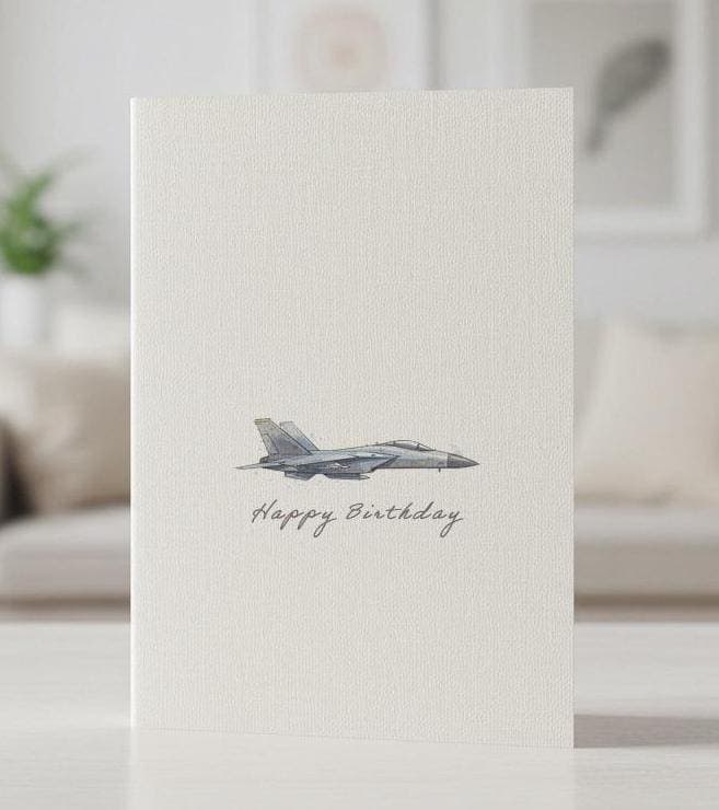 Linen birthday card featuring a watercolour fighter jet banking against a pale sky