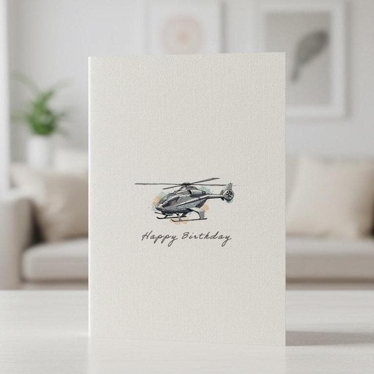 Linen birthday card featuring a watercolour helicopter, standing on a table